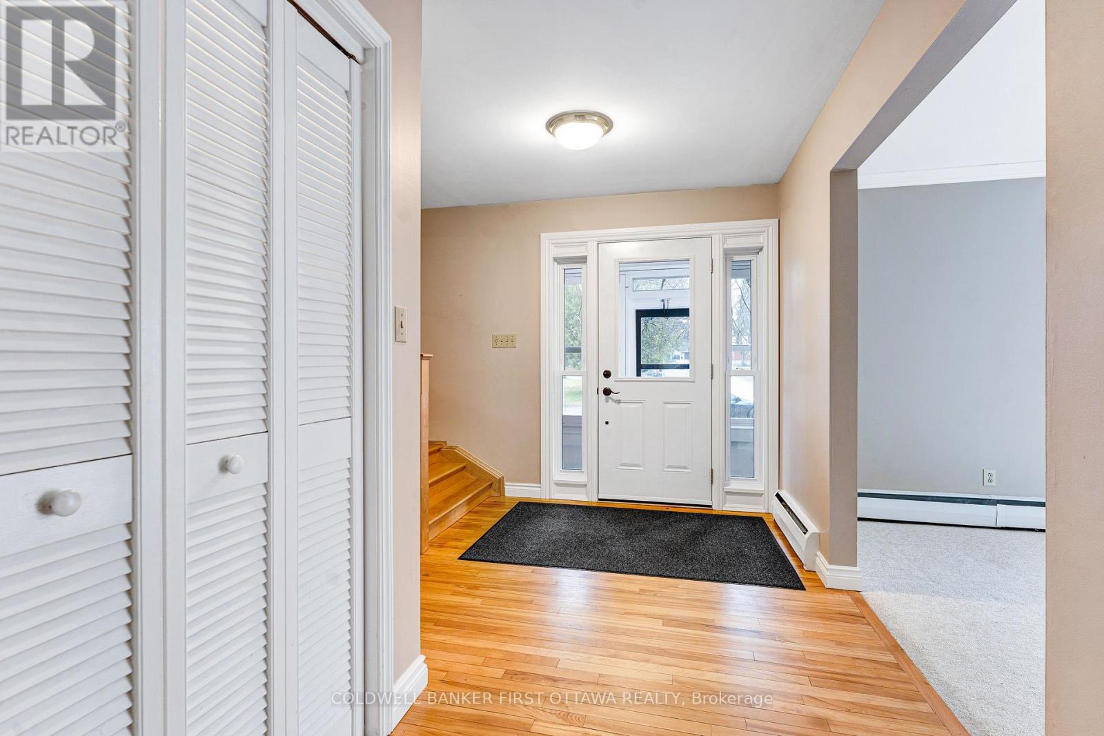 Foyer has convenient closet