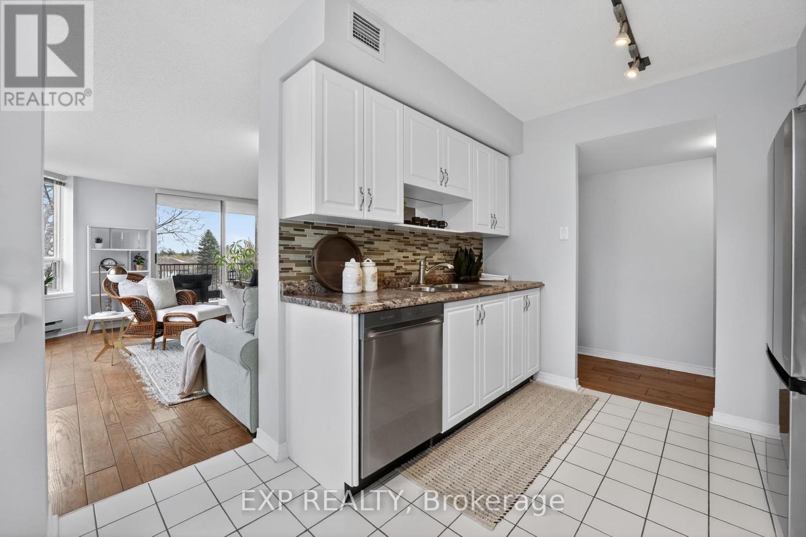 #301 8111 FOREST GLEN DRIVE - 19
