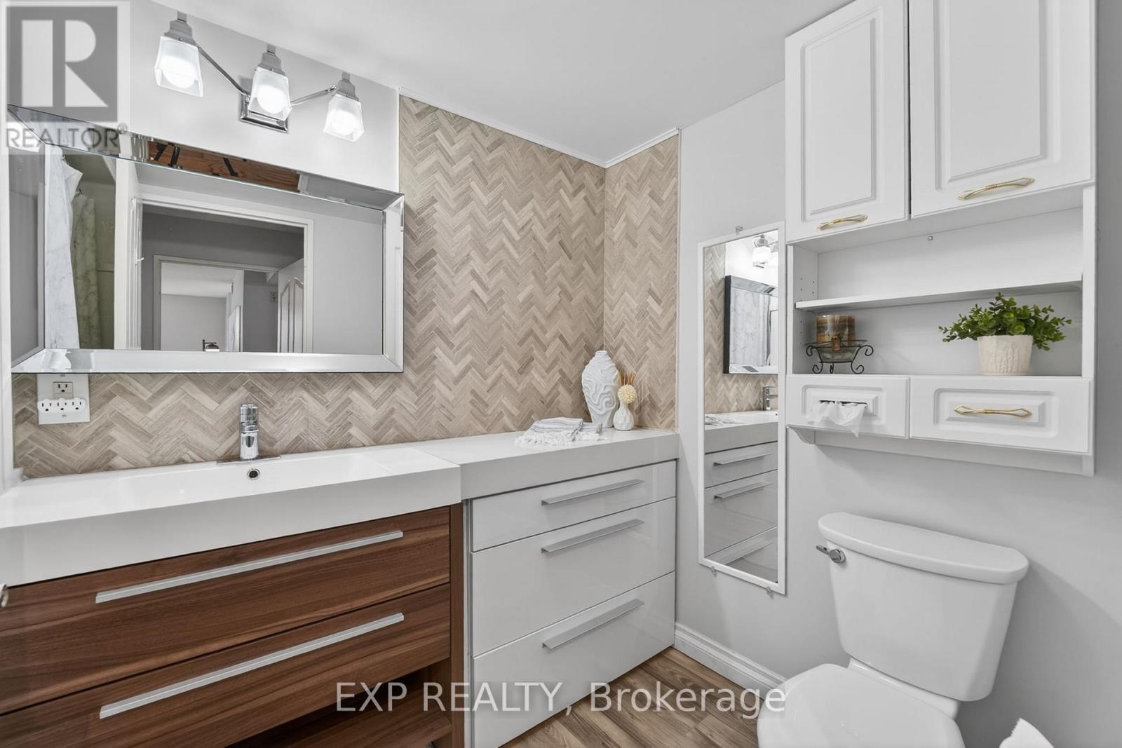 #301 8111 FOREST GLEN DRIVE - 27