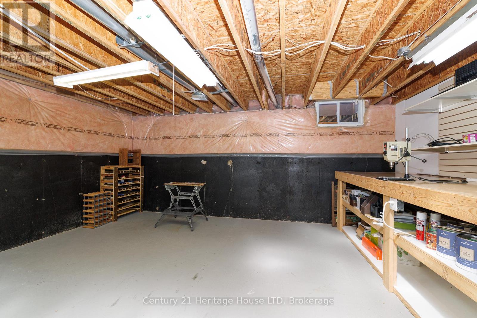 Clean basement with workbench