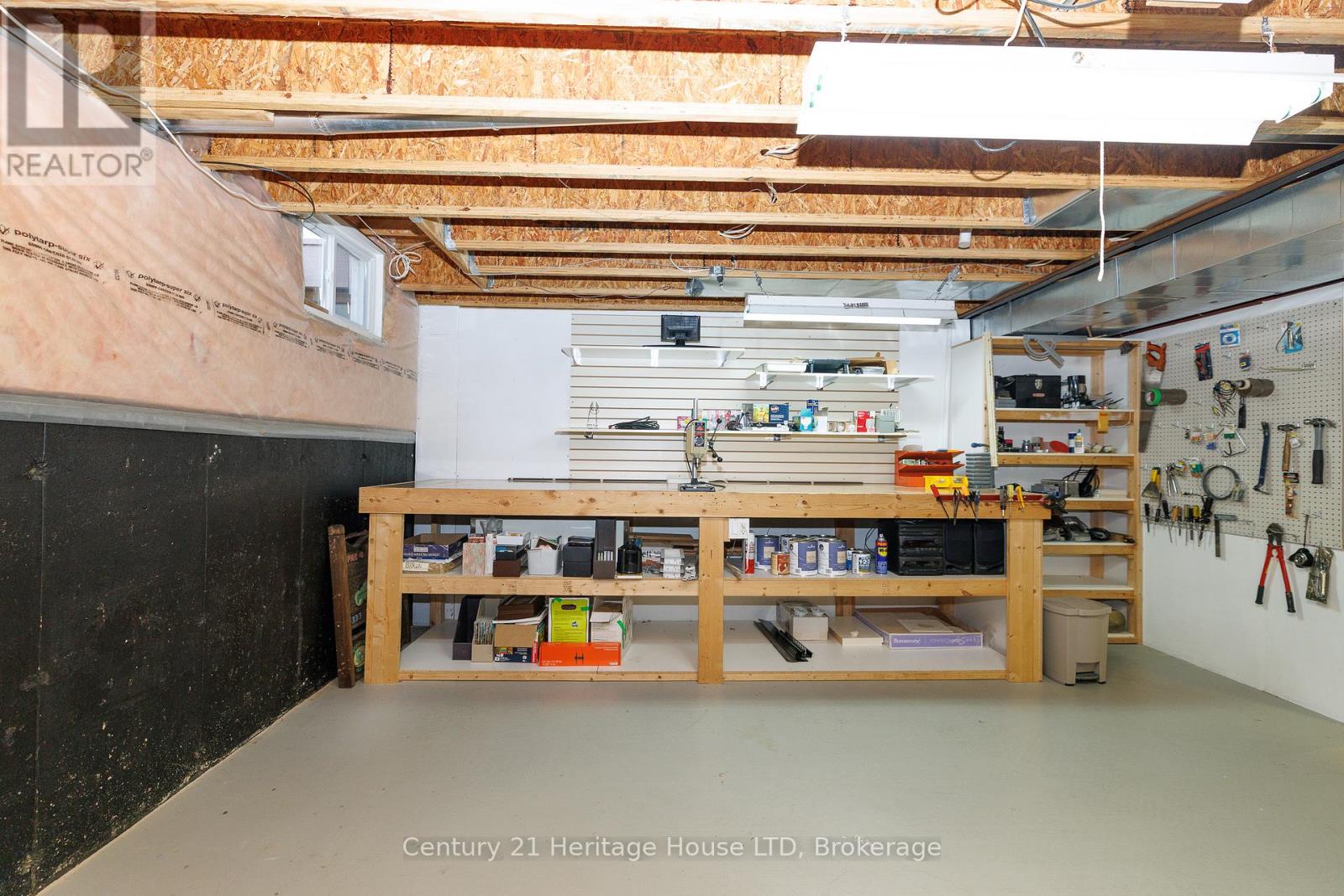 Clean basement with workbench