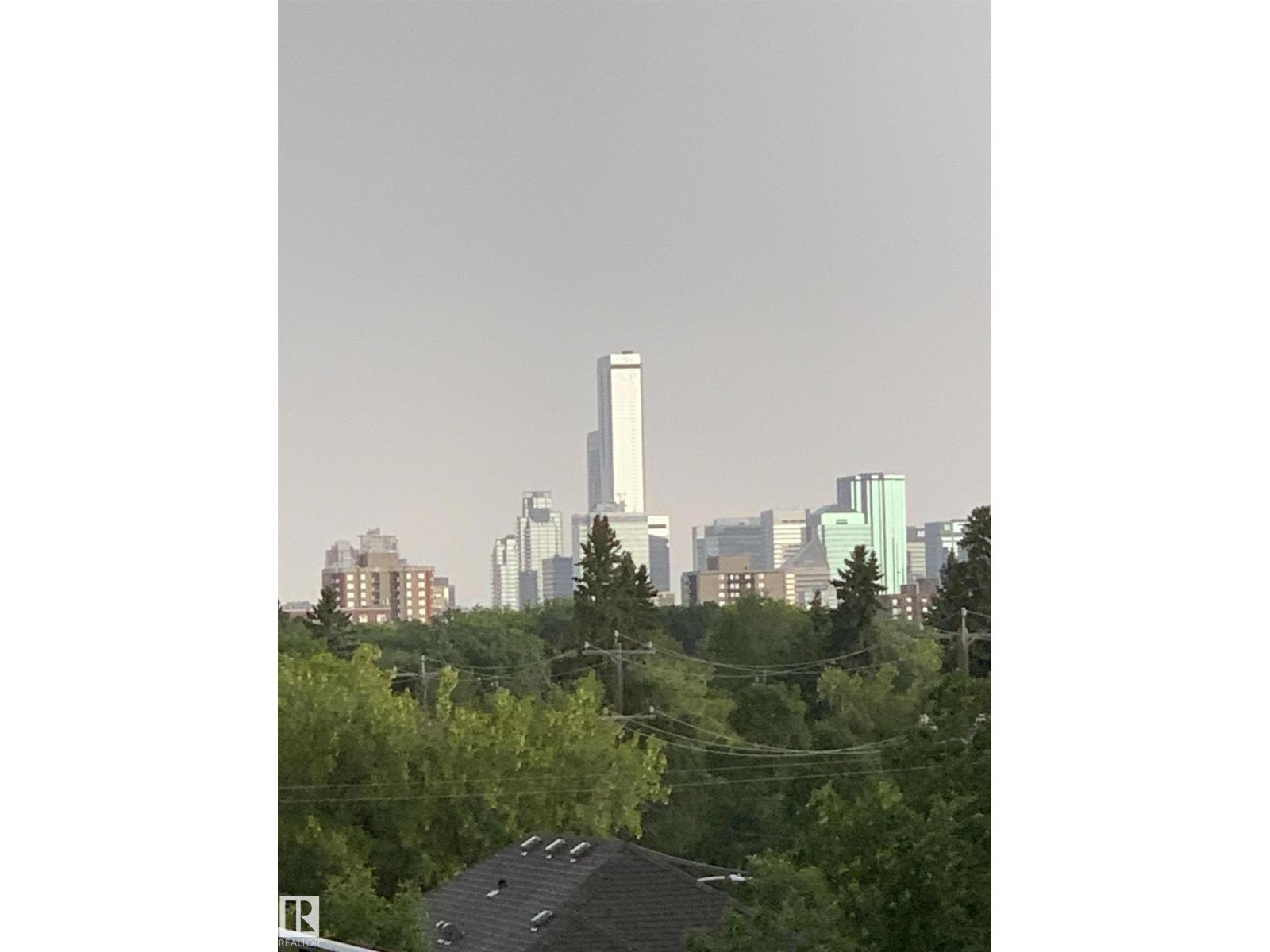 #406 10808 71 AV NW - 55