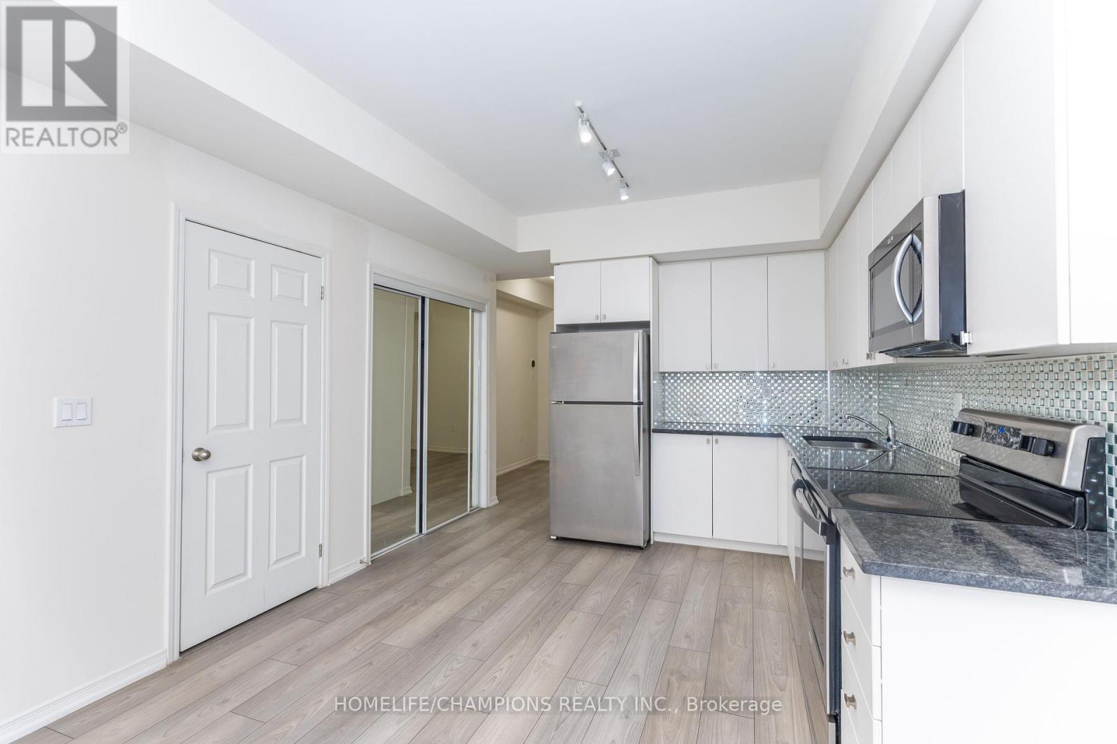 #201 8825 SHEPPARD AVENUE E - 2