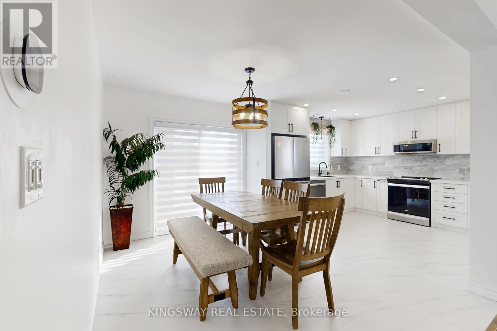 Dining Room has Sliding Doors to Backyard Deck