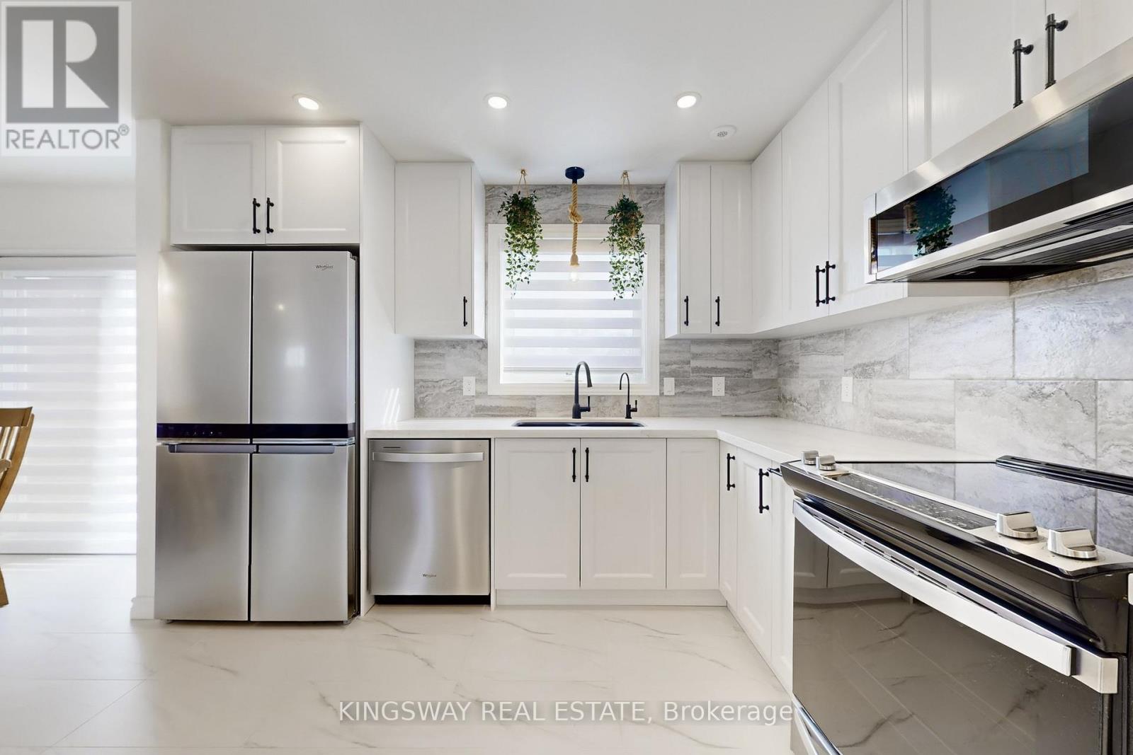 Kitchen Overlooks Patio/Backyard