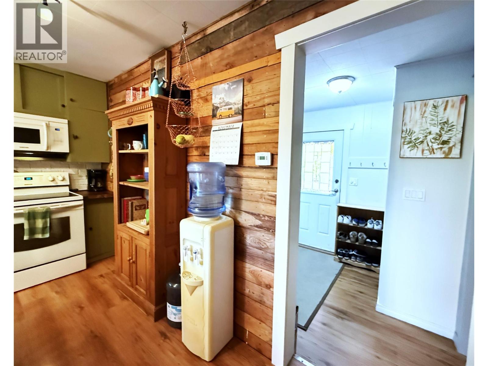 Kitchen looking through to rear foyer/hall.