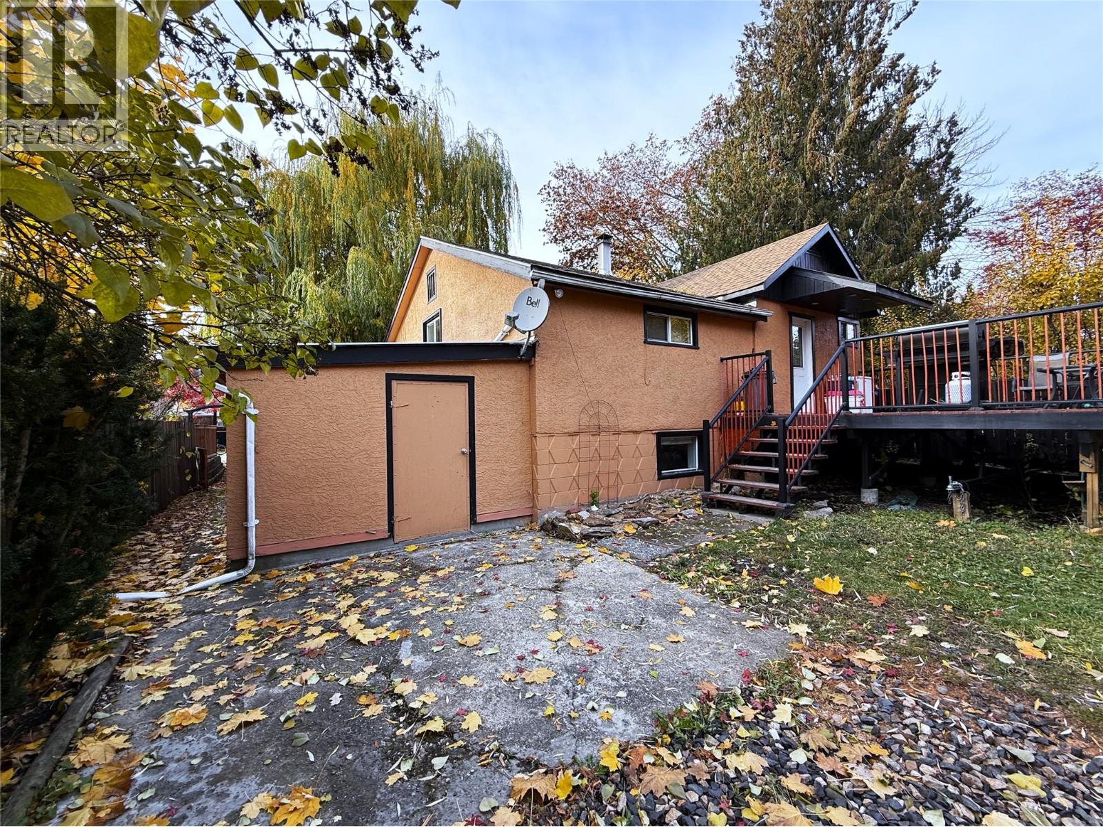Rear of home showing raised deck