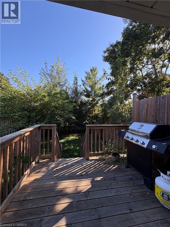 Deck featuring area for grilling