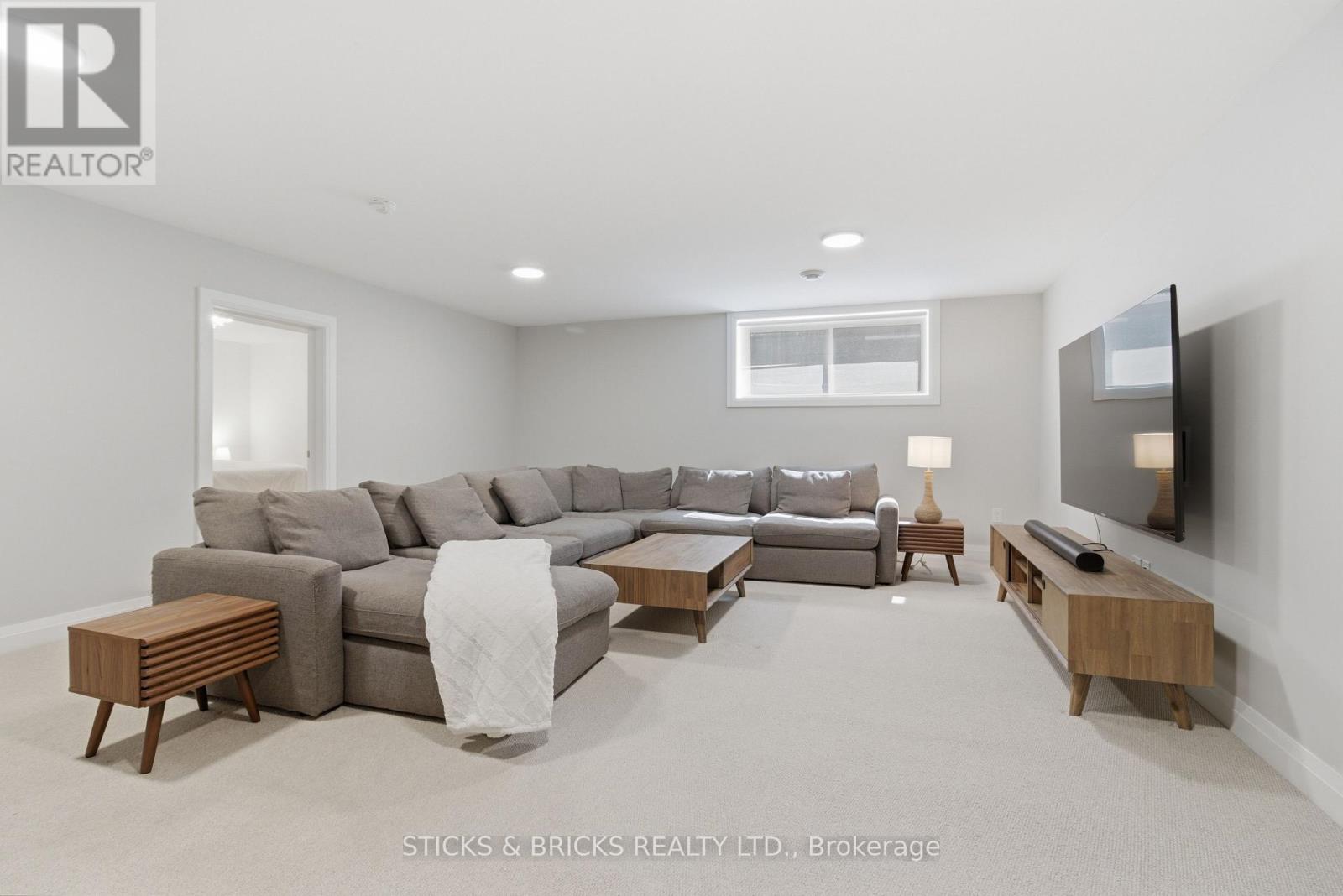 Family room with cozy broadloom
