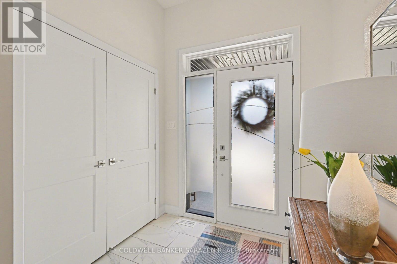 Welcoming front entry with generous storage