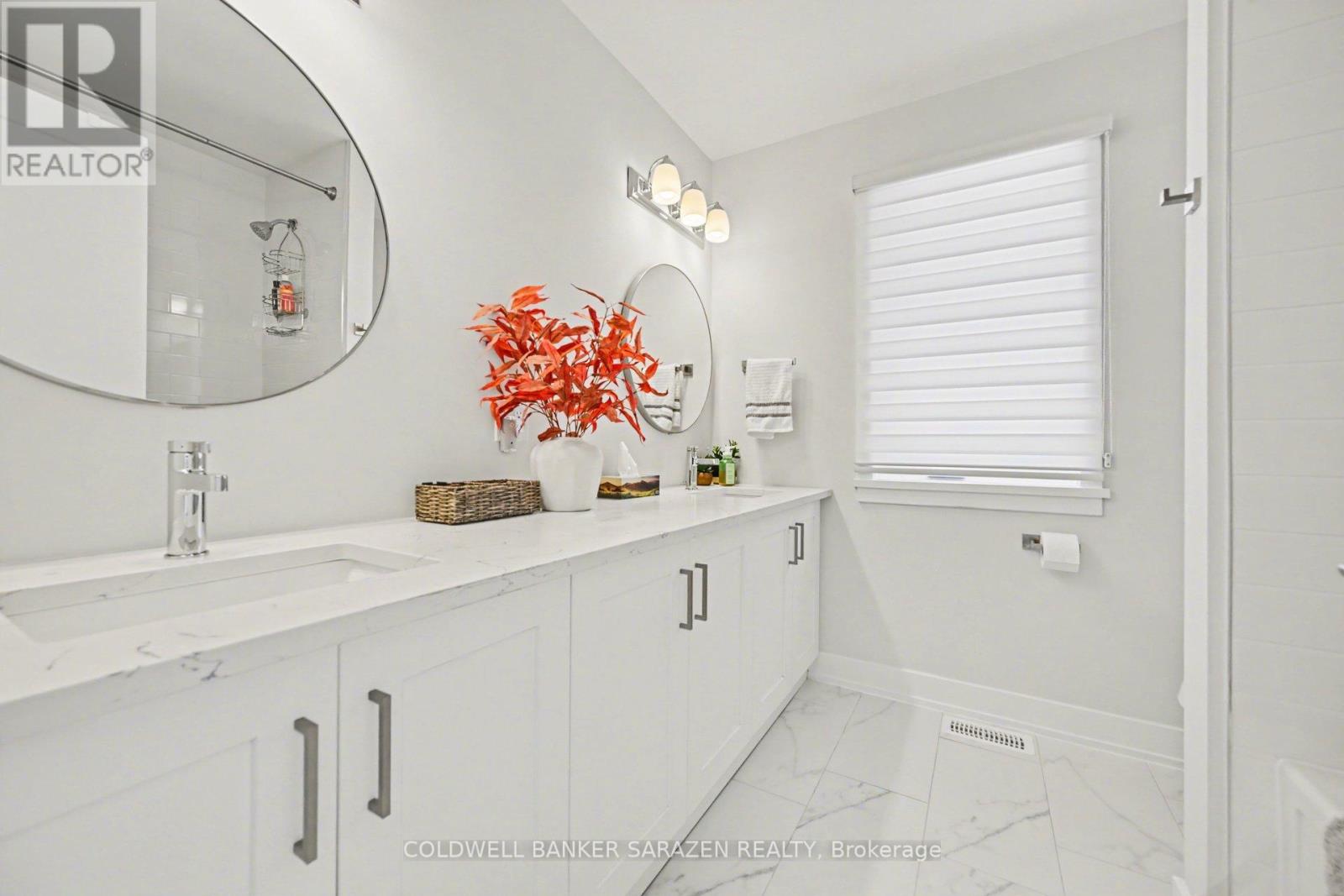 Main bath upstairs. Double sinks