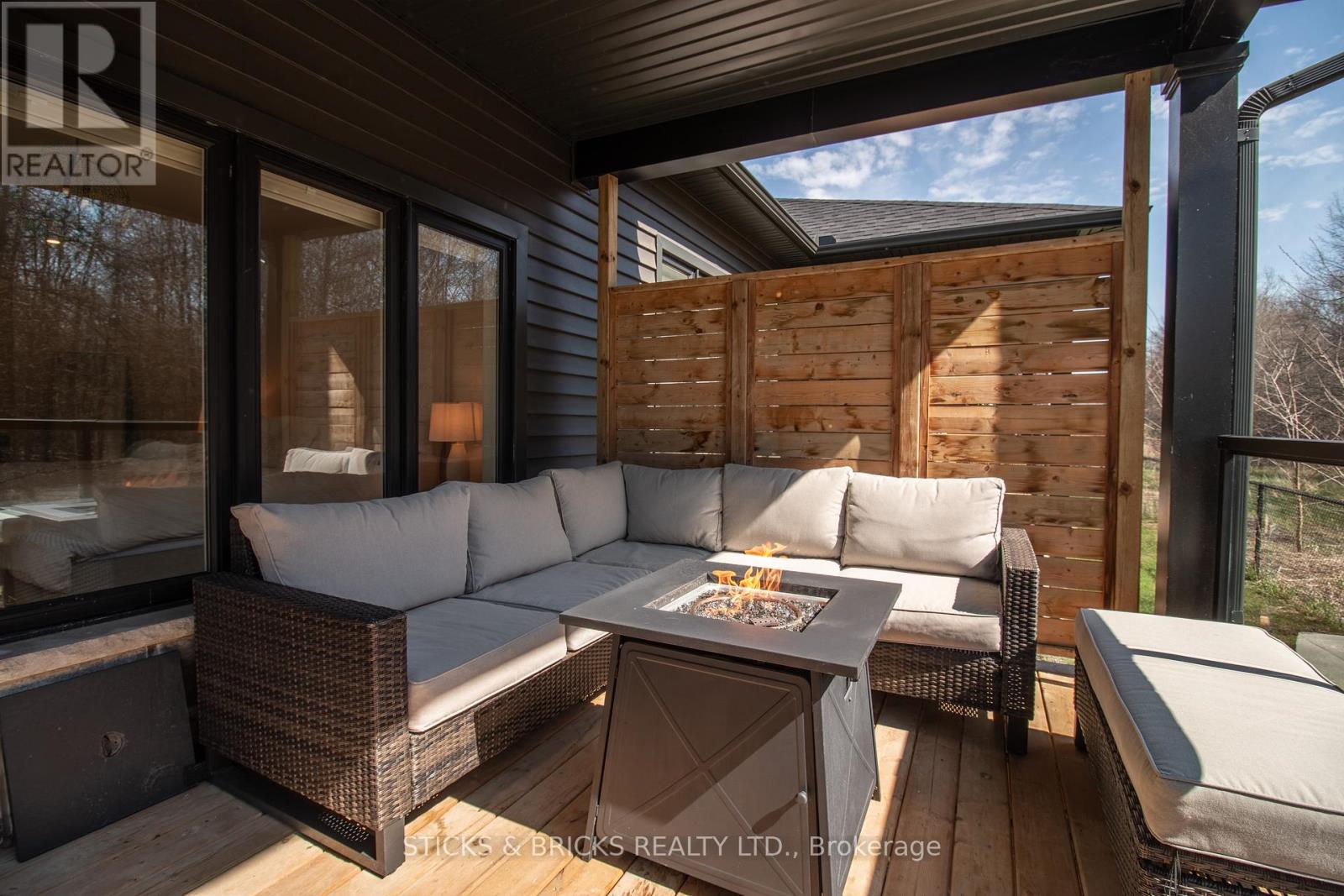 Private covered deck with ceiling fan