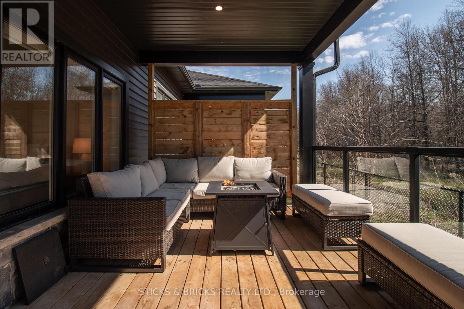 Overlooks natural wooded area