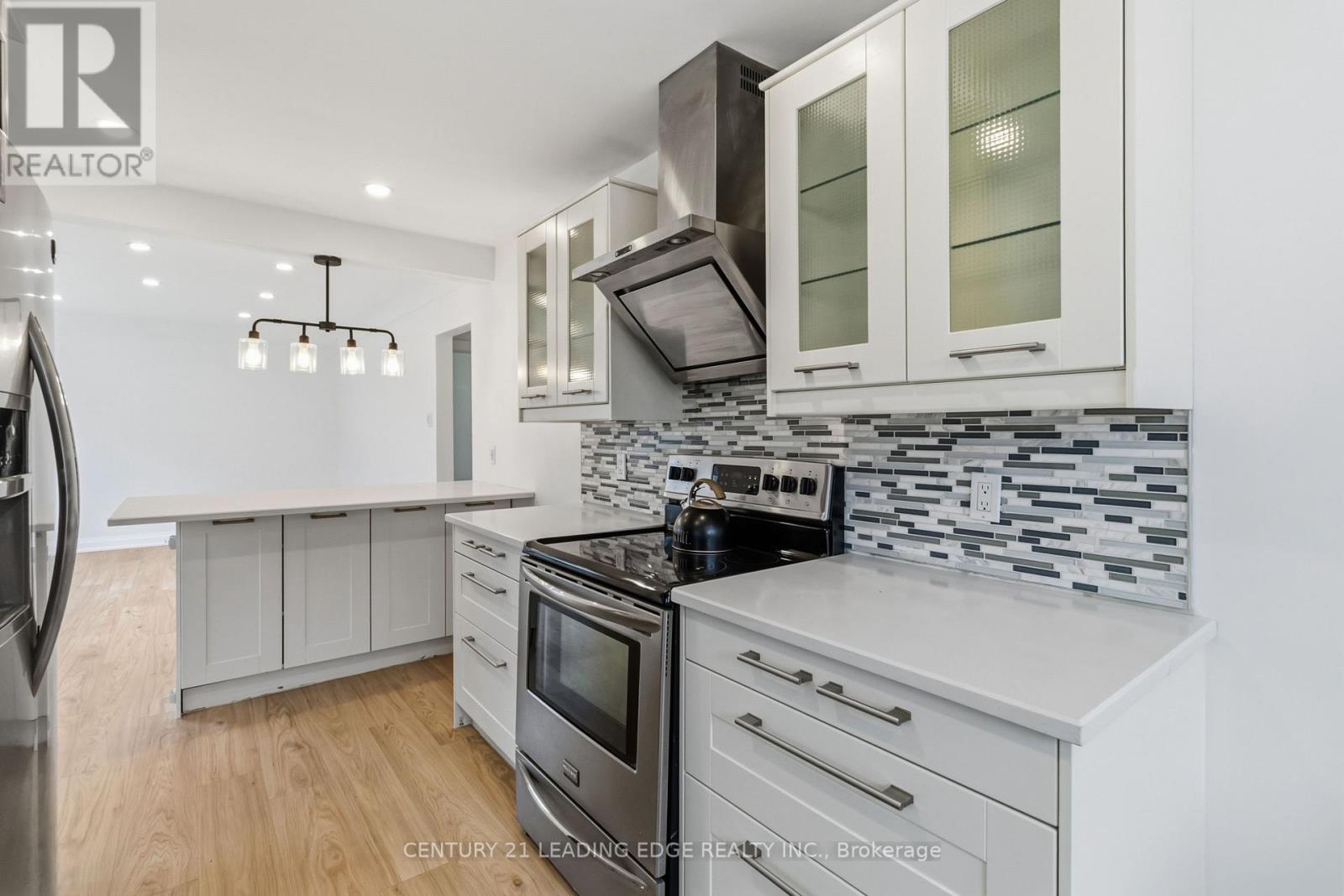 Glass mosiac tile backsplash