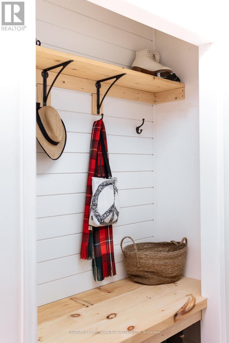Inside entry from attached garage leads to laundry