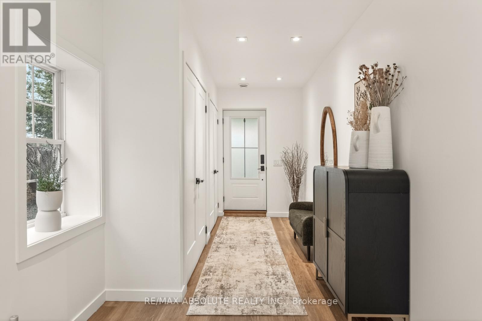 Spacious foyer with heated floors