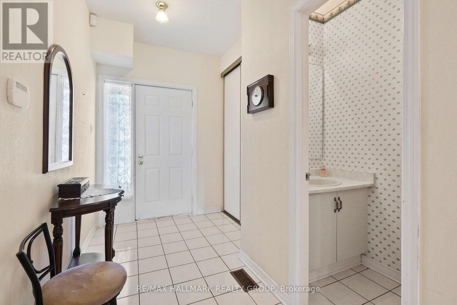 2 piece bath and inside garage entry off the foyer