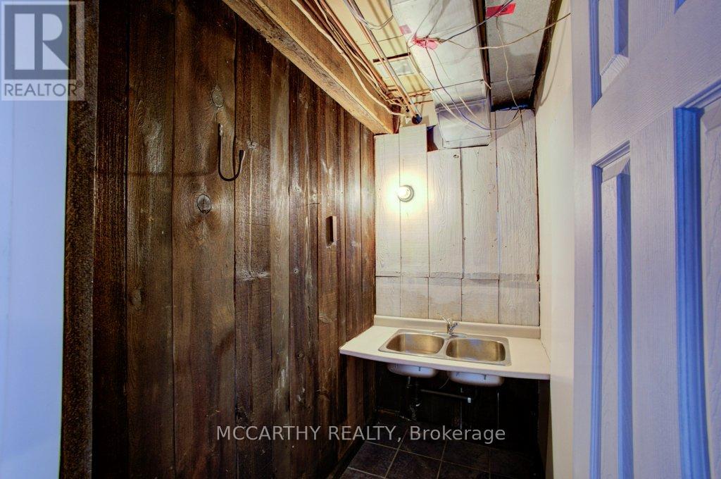 Service room with a sink main floor
