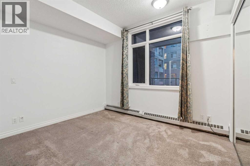 232, 990 Centre Avenue NE — photo 16