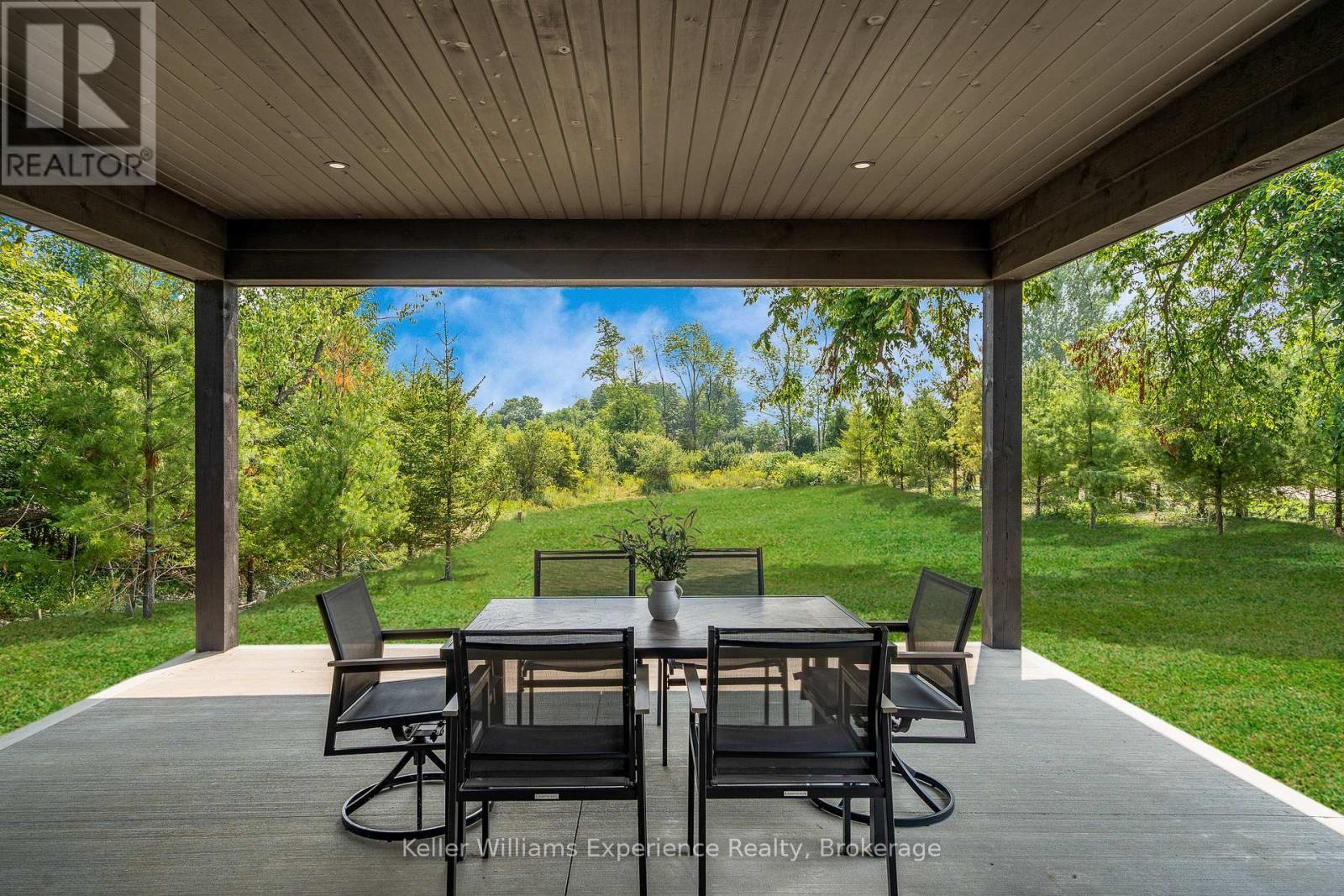 19x19 Covered Porch Surrounded by 100+ Trees