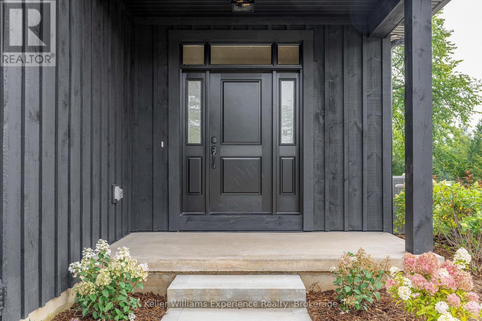 Onyx Board-and-Batten Siding with Natural Stone