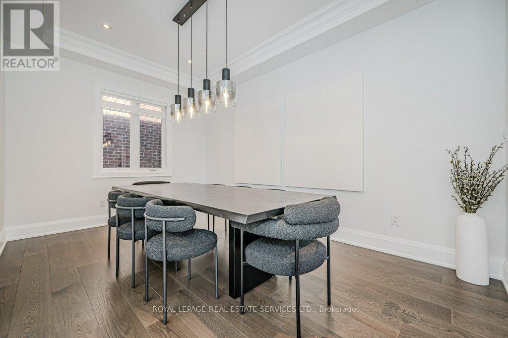 Dining Room Features a Coffered Ceiling