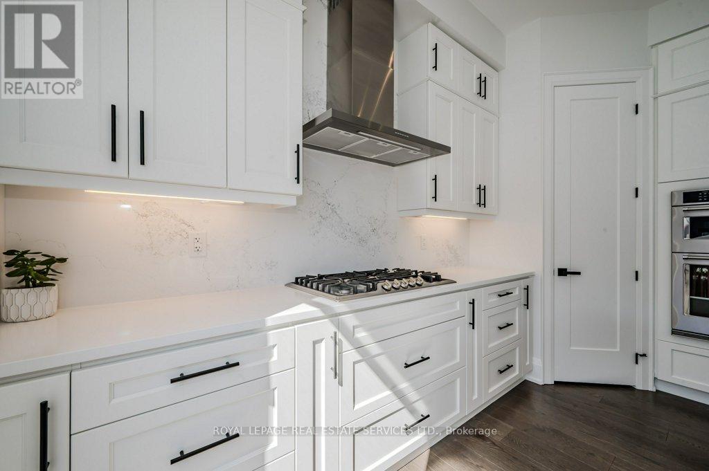 Quartz Countertops and High-End S/S Appliances