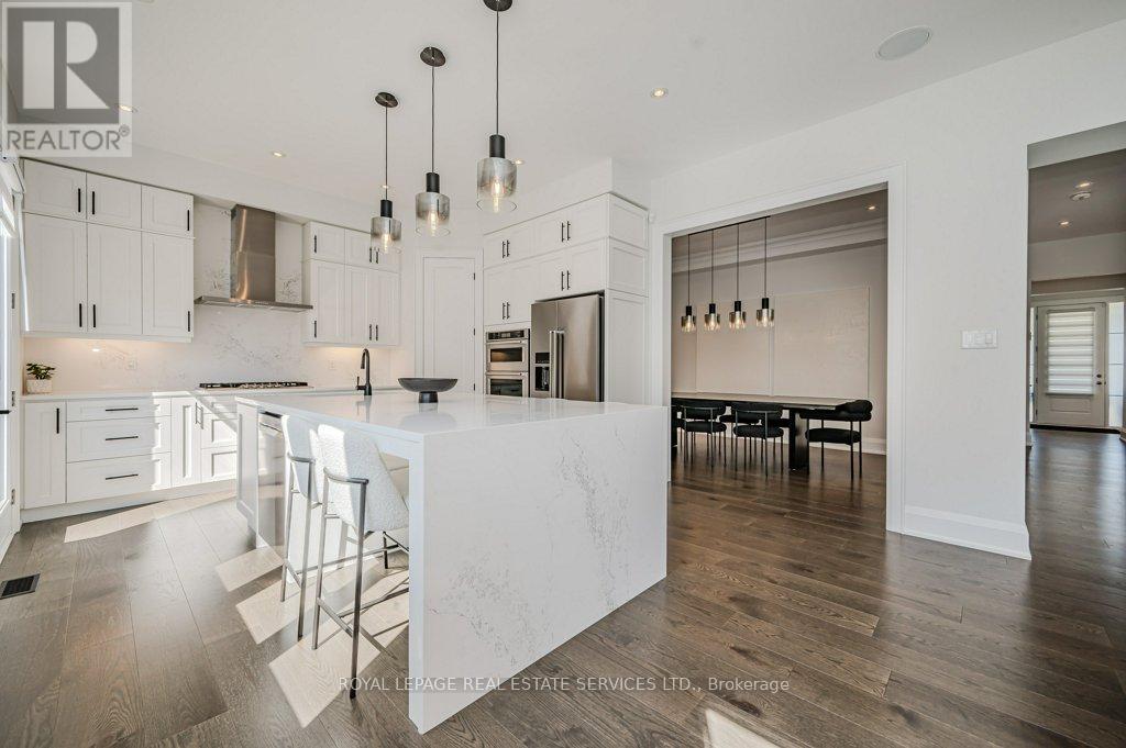 Gourmet Kitchen with an Oversized Island w/Seating