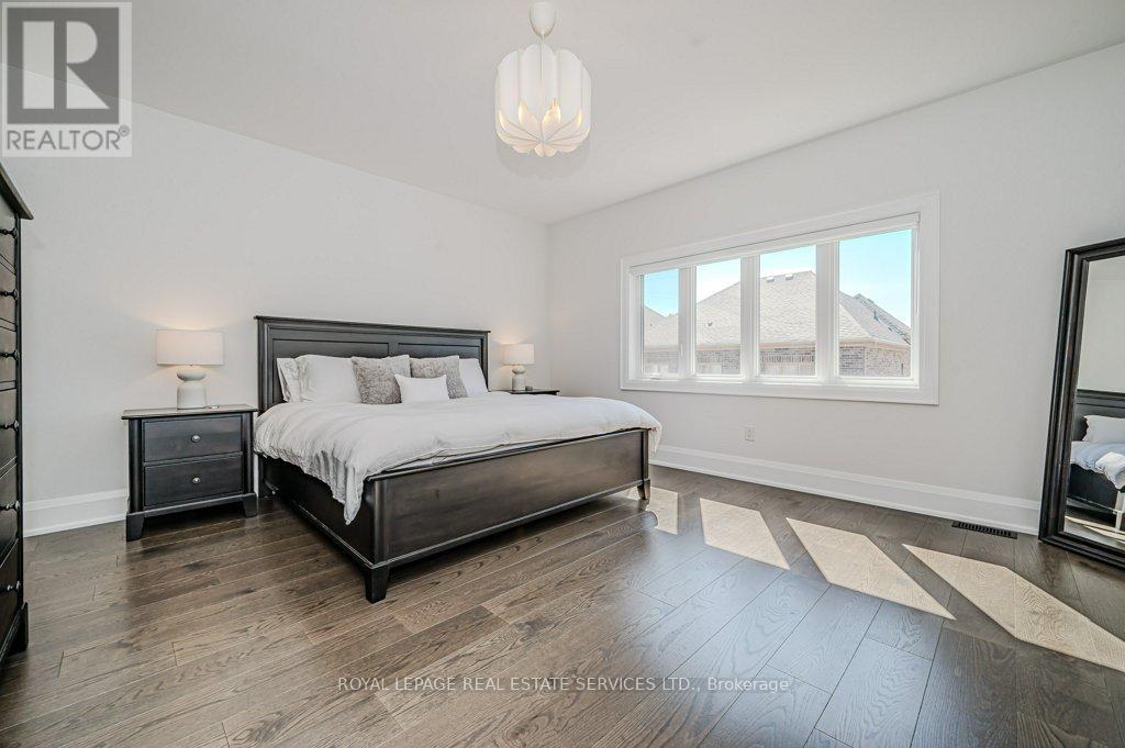 Primary Suite w/Walk-In Closet & Spa-Like Ensuite