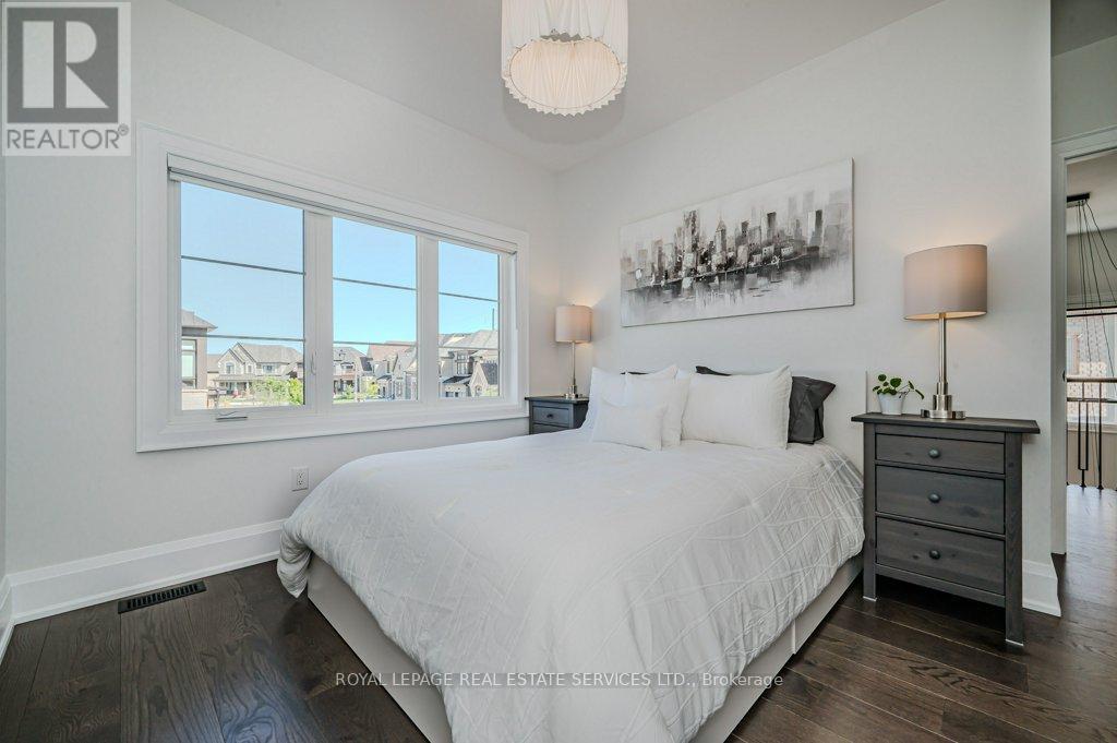 Third Bedroom with Wide Plank Hardwood Flooring