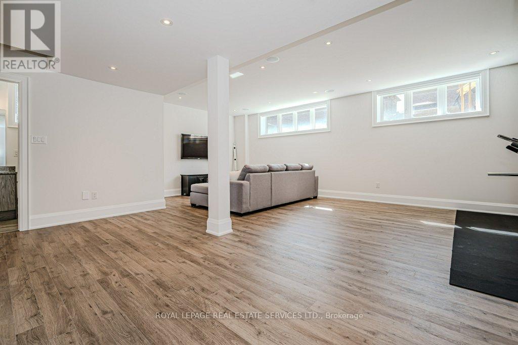 Spacious Recreation Room w/Luxury Vinyl Flooring