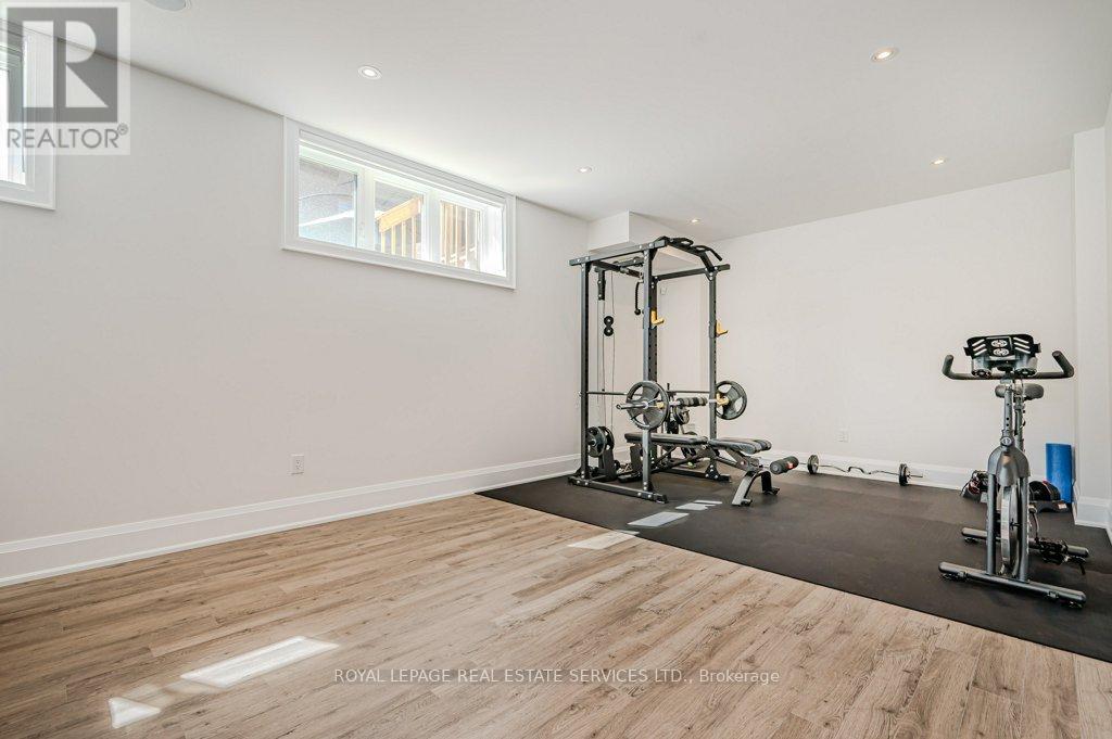 Spacious Recreation Room w/Luxury Vinyl Flooring