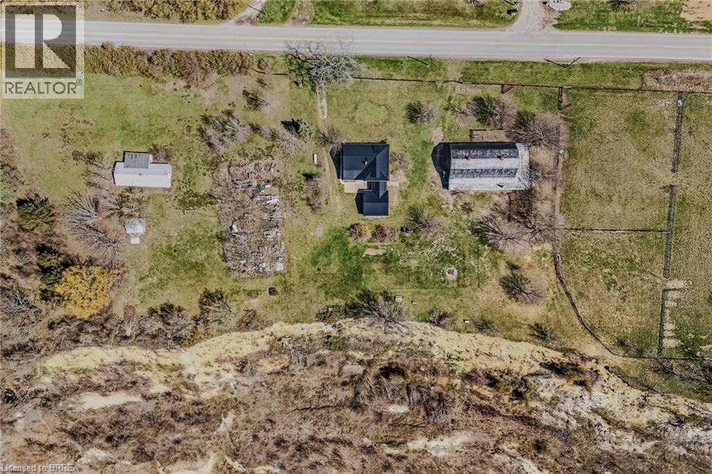 Aerial Property View. Depicting the property's structures, land, and surrounding terrain