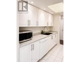 Laundry room - 214 - 1 Rowntree Road, Toronto, ON M9V5G7 Photo 7