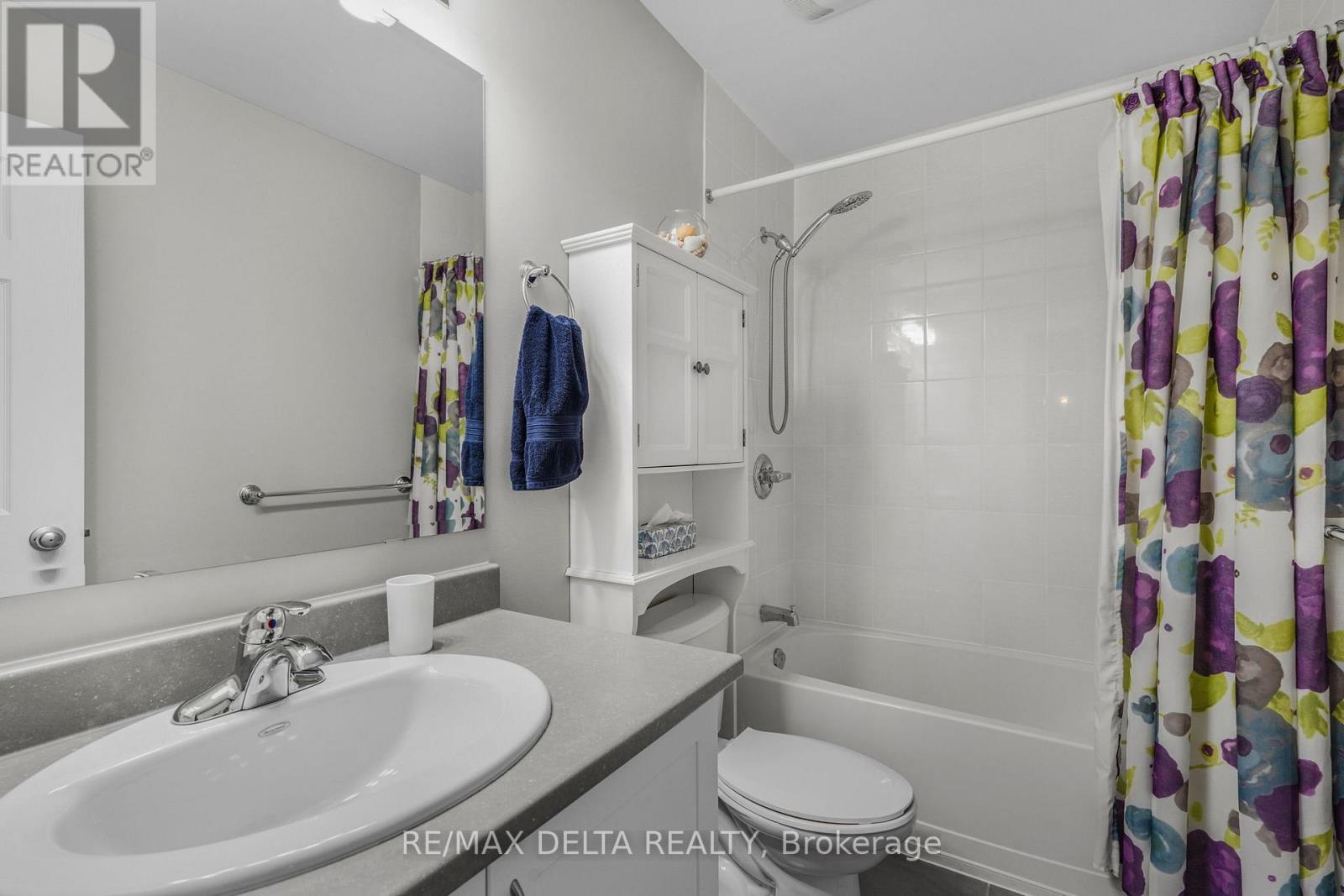 Main 4 pieces bathroom with tub & shower.