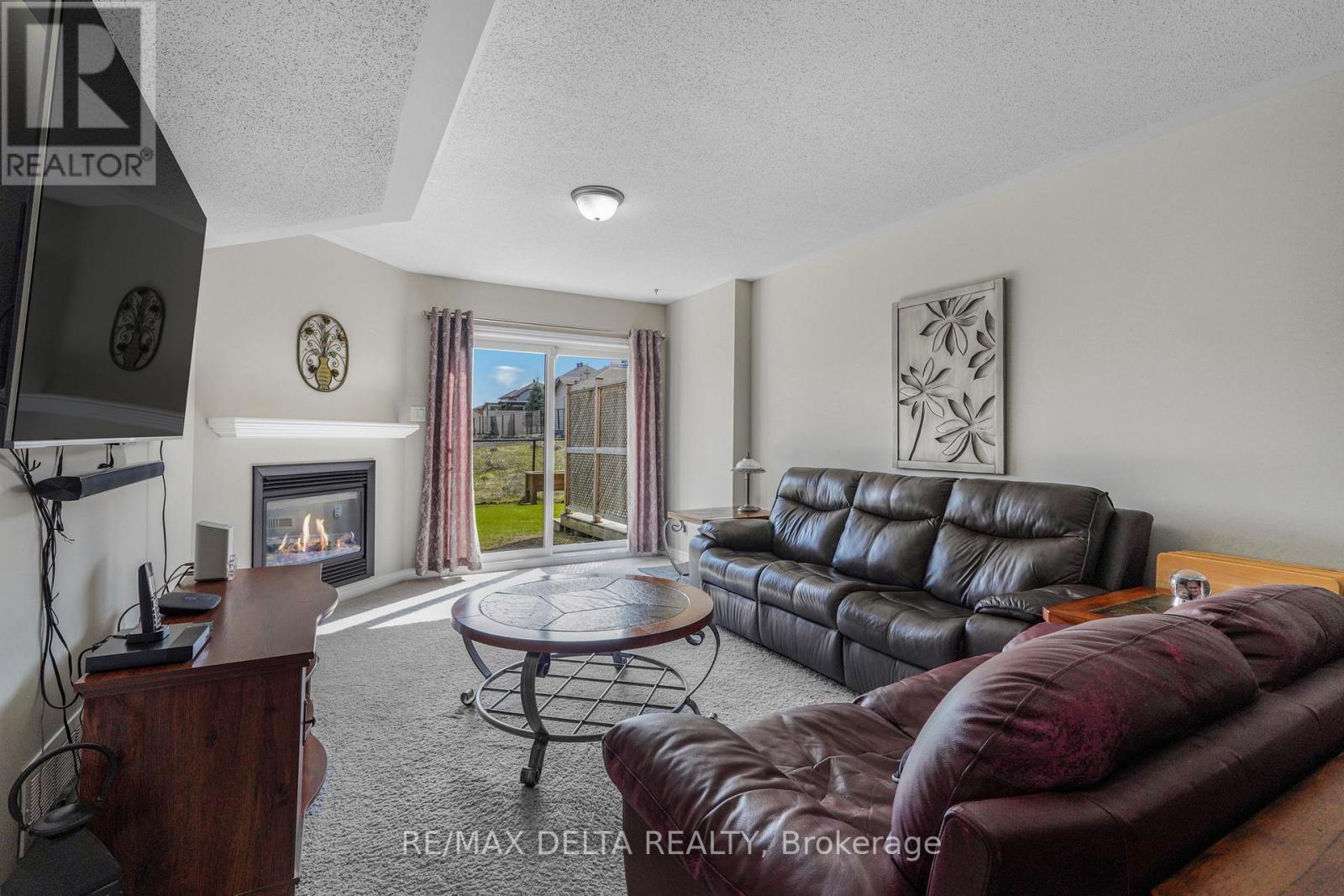 Huge family room w/ patio door access to yard.