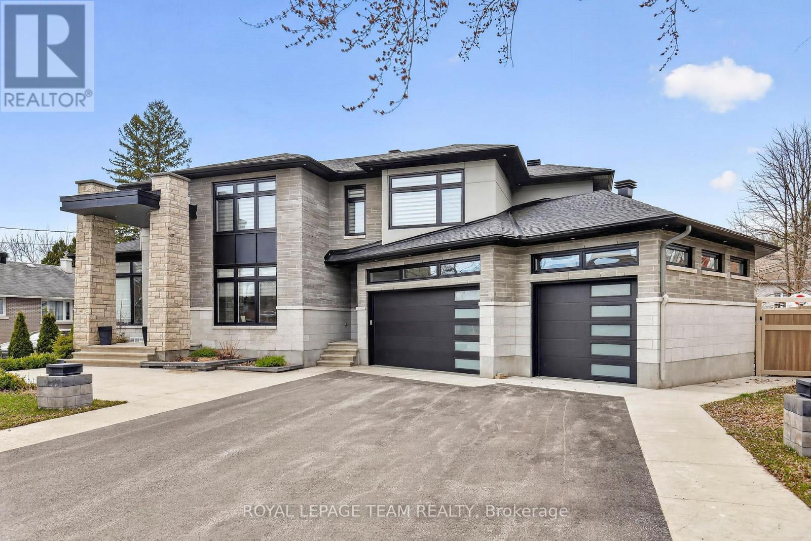 Triple car garage with Post Auto Lift