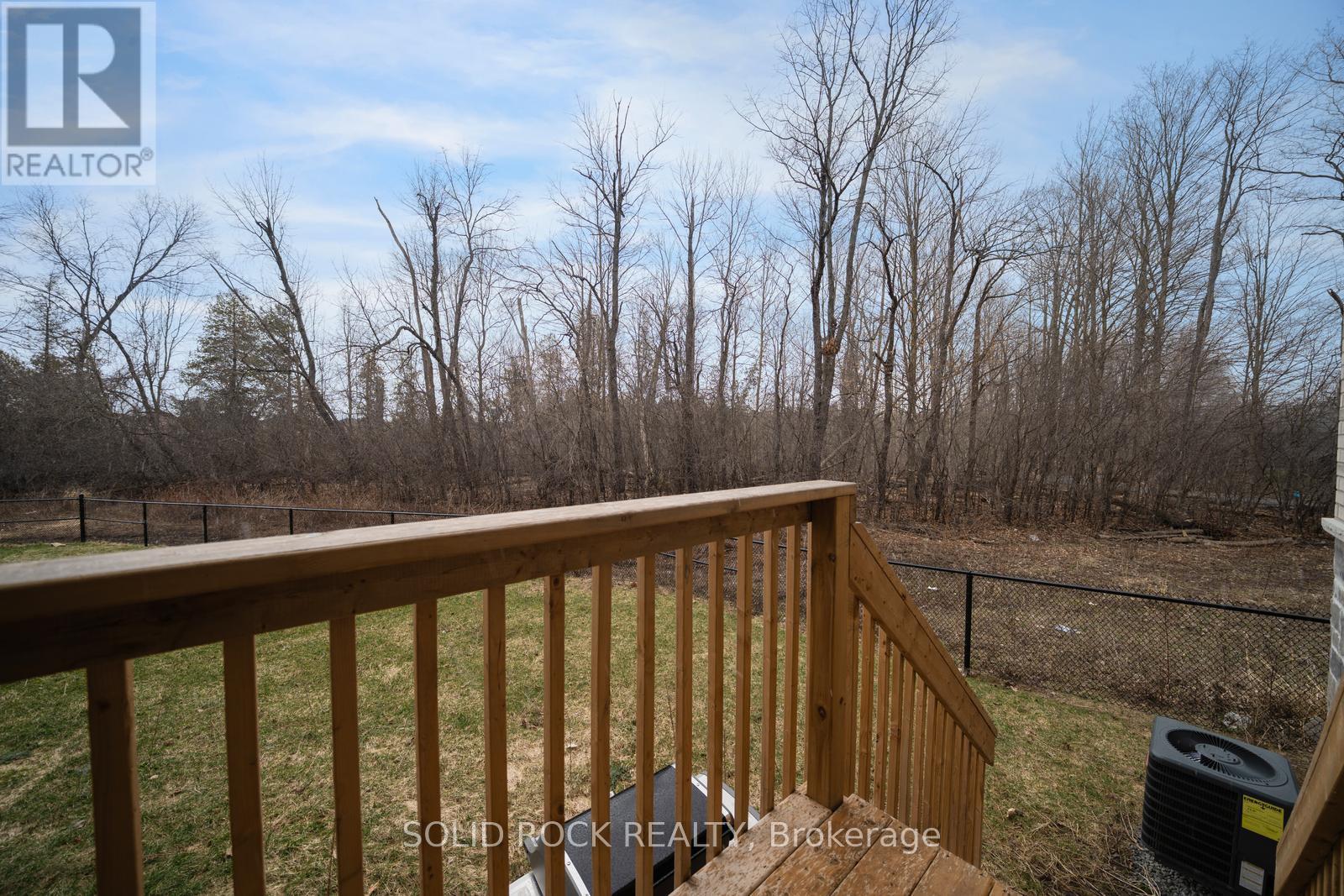 Side Yard facing Trail