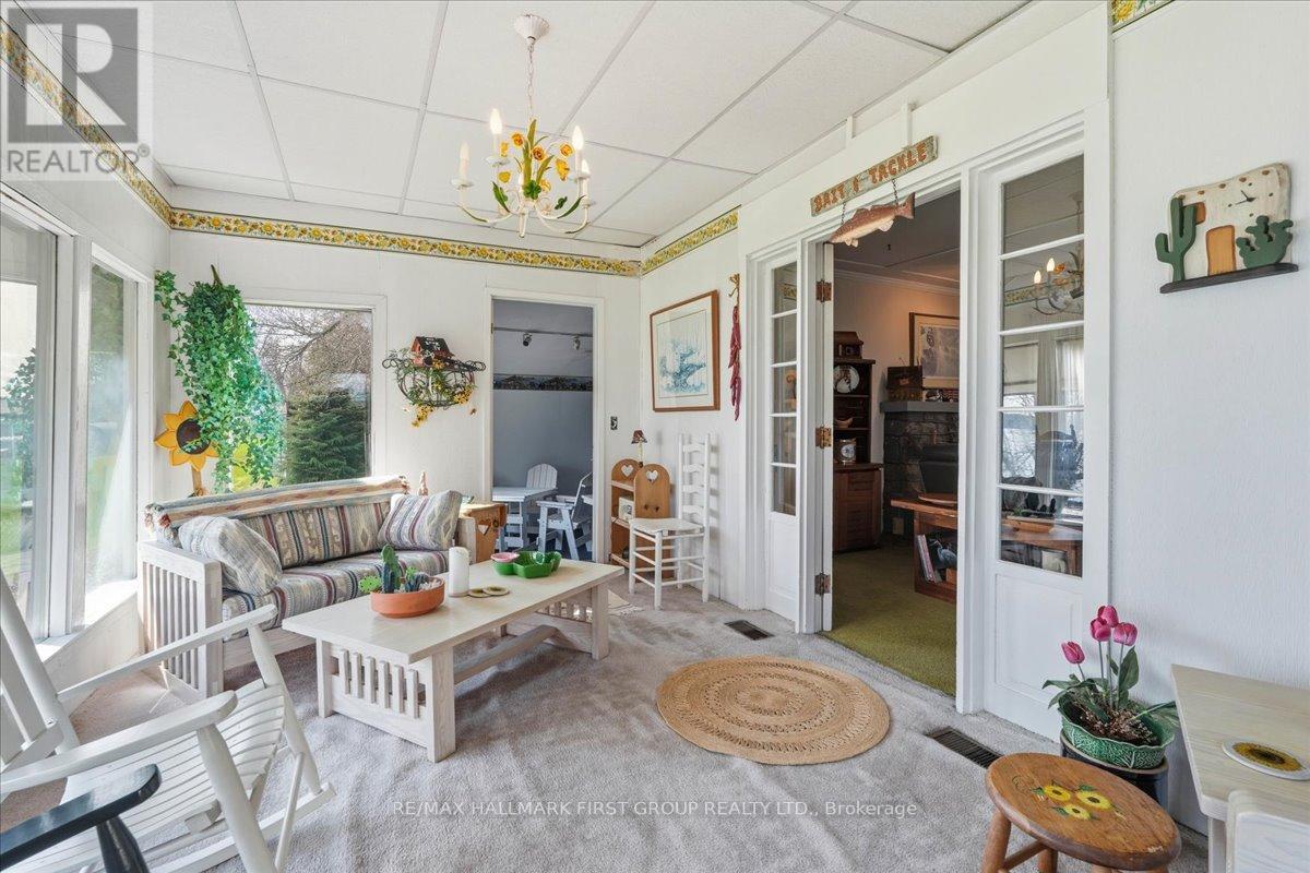 Sunroom with walkout to deck
