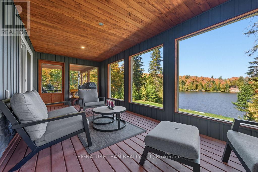 Enclosed Deck Overlooking the Lake