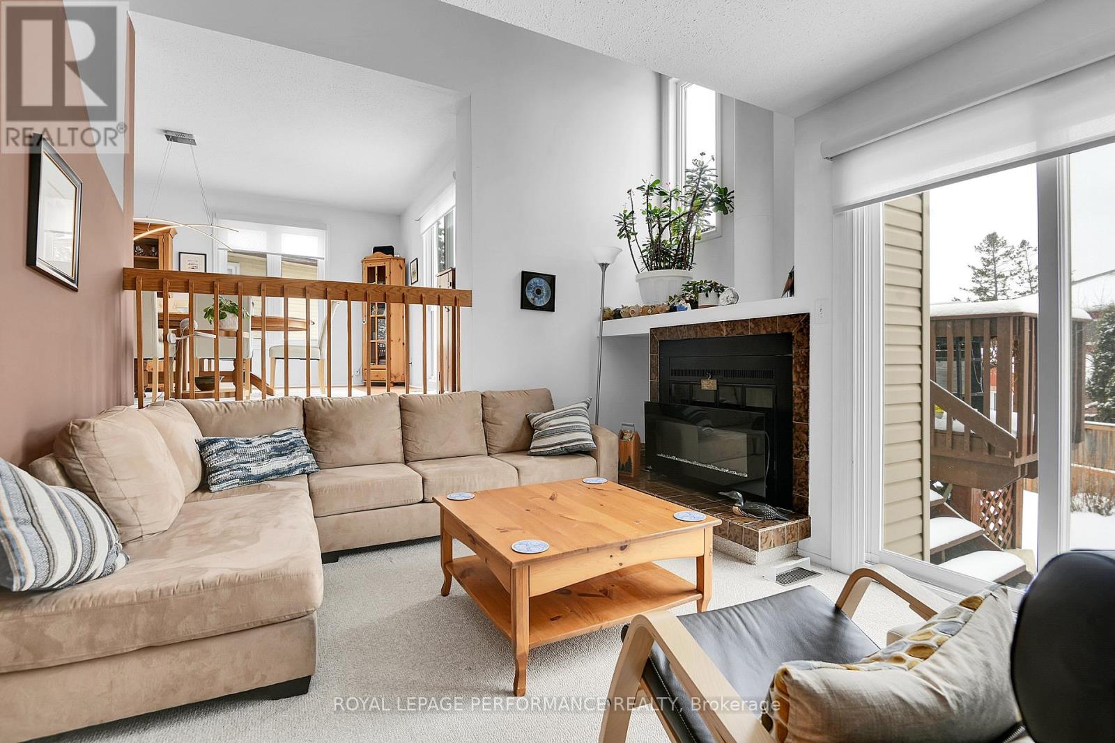 Family Rm w/fireplace & patio doors to back yard