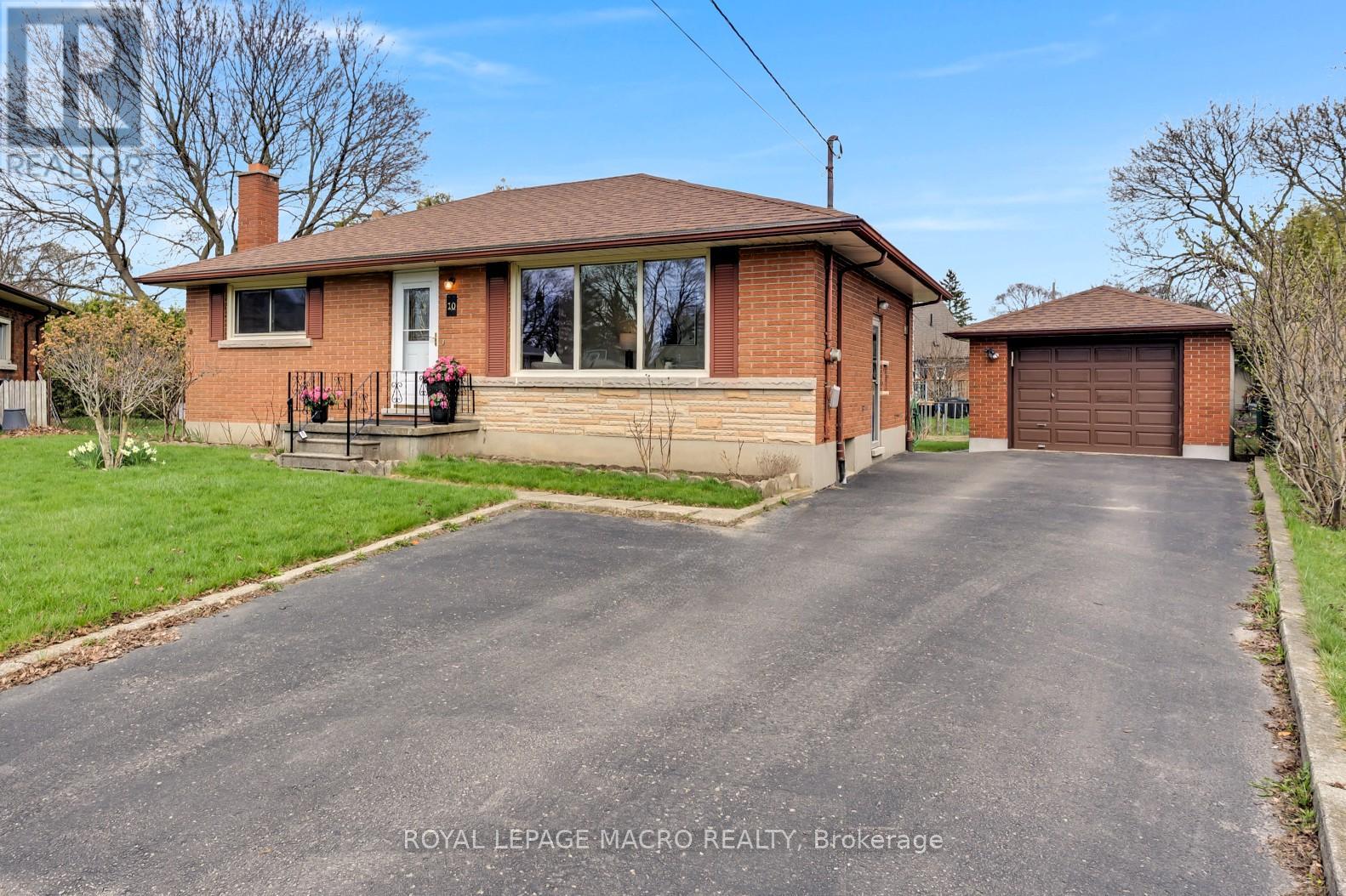 Side entrance and single detached garage.