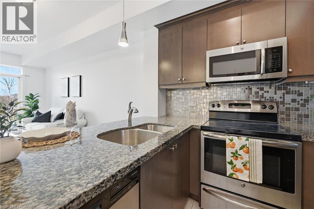2300 UPPER MIDDLE Road W Unit# 304, Oakville, Ontario, L6M0T4 — Photo 12