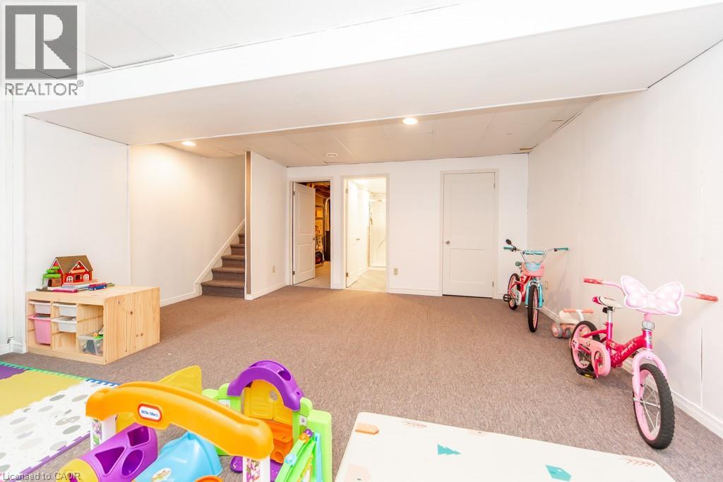 Rec room featuring light carpet and recessed lighting