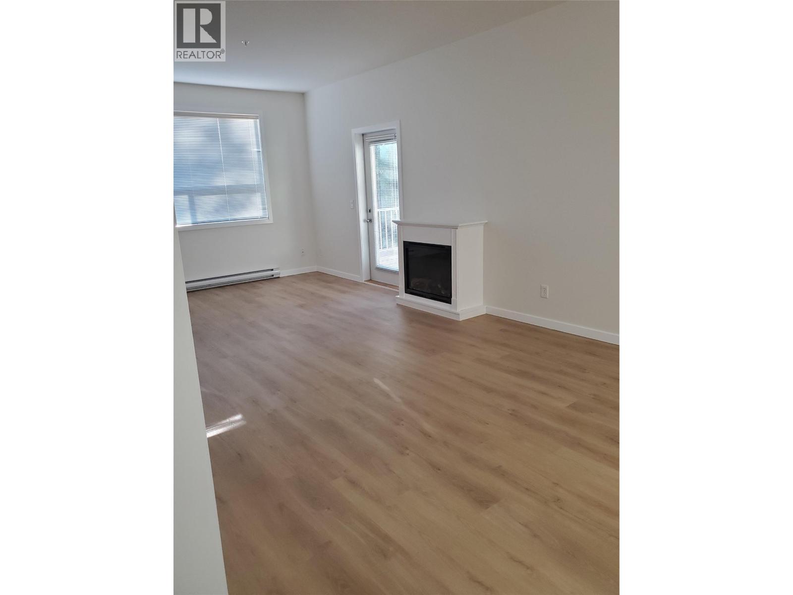 #210 778 Rutland Road N Unit# 210 - 5