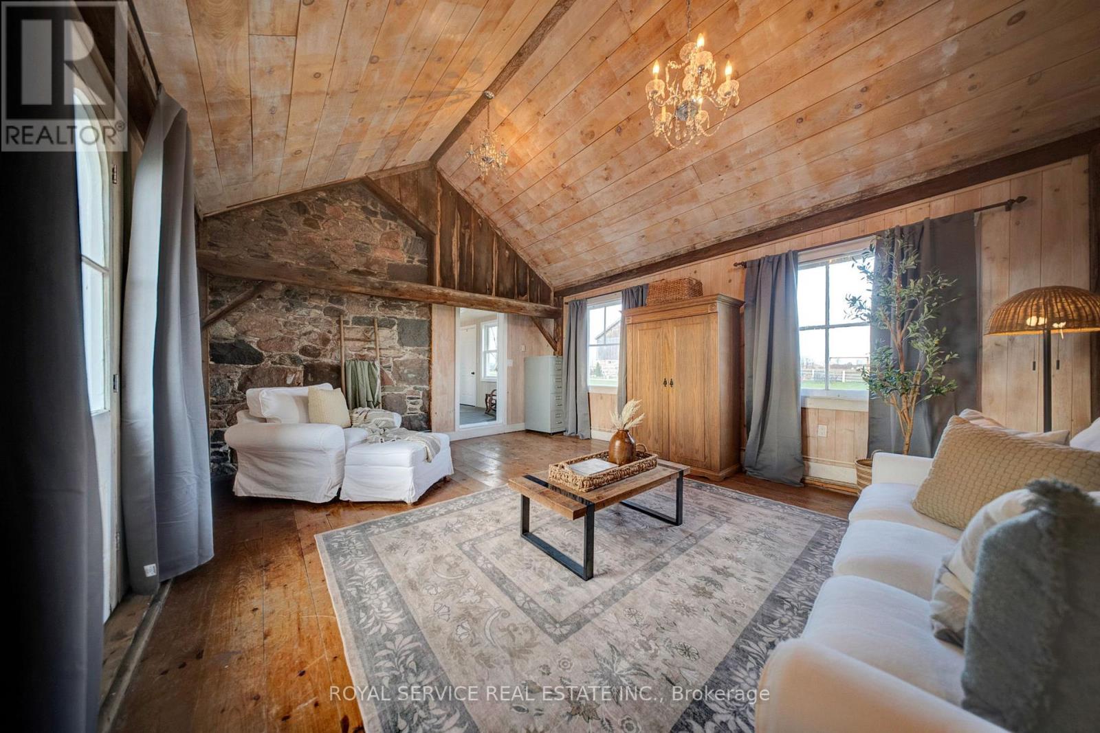 Stone Field Feature Wall, Barn Beams & many window