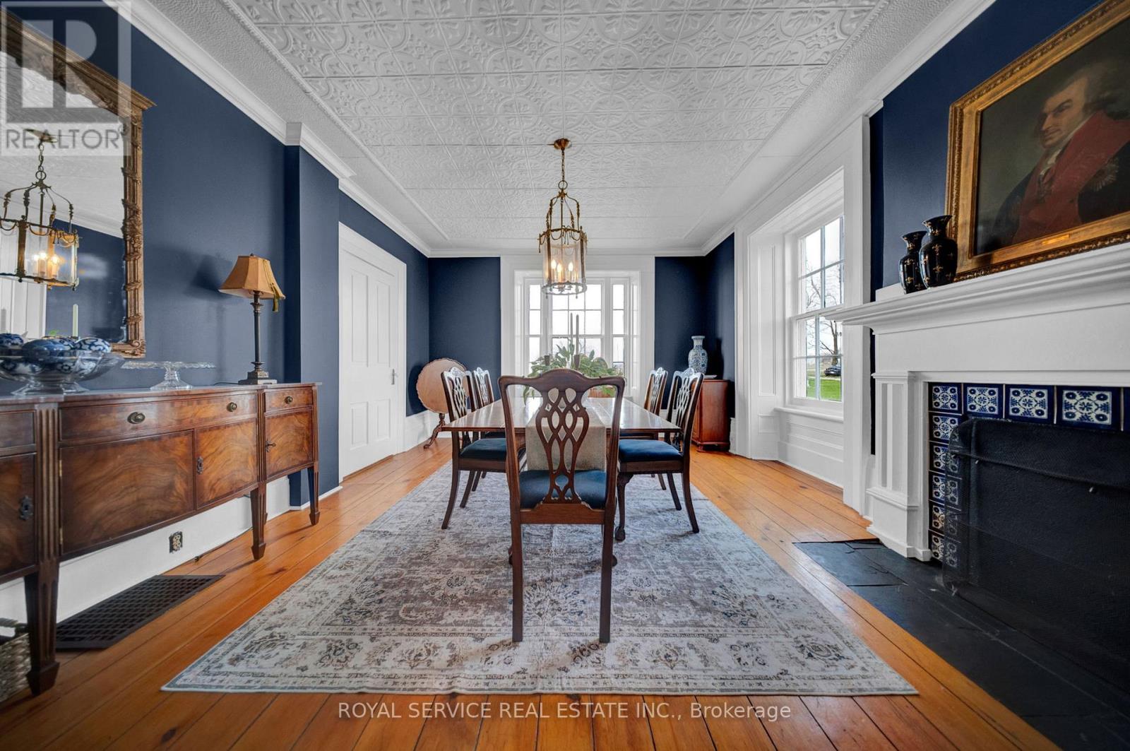 Dining rm with Tin Ceilings & Original Wood Floors