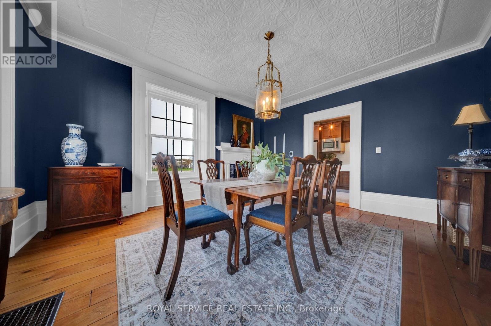 Dining Room with Tin Ceiling & Original Wood Trim