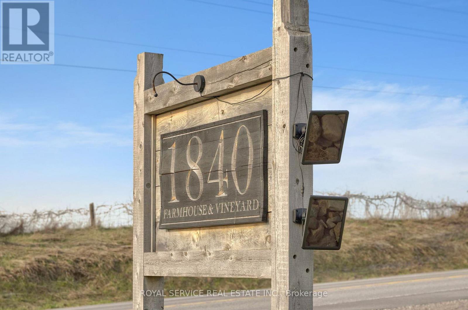 Road side signage of family owned & run Vineyard