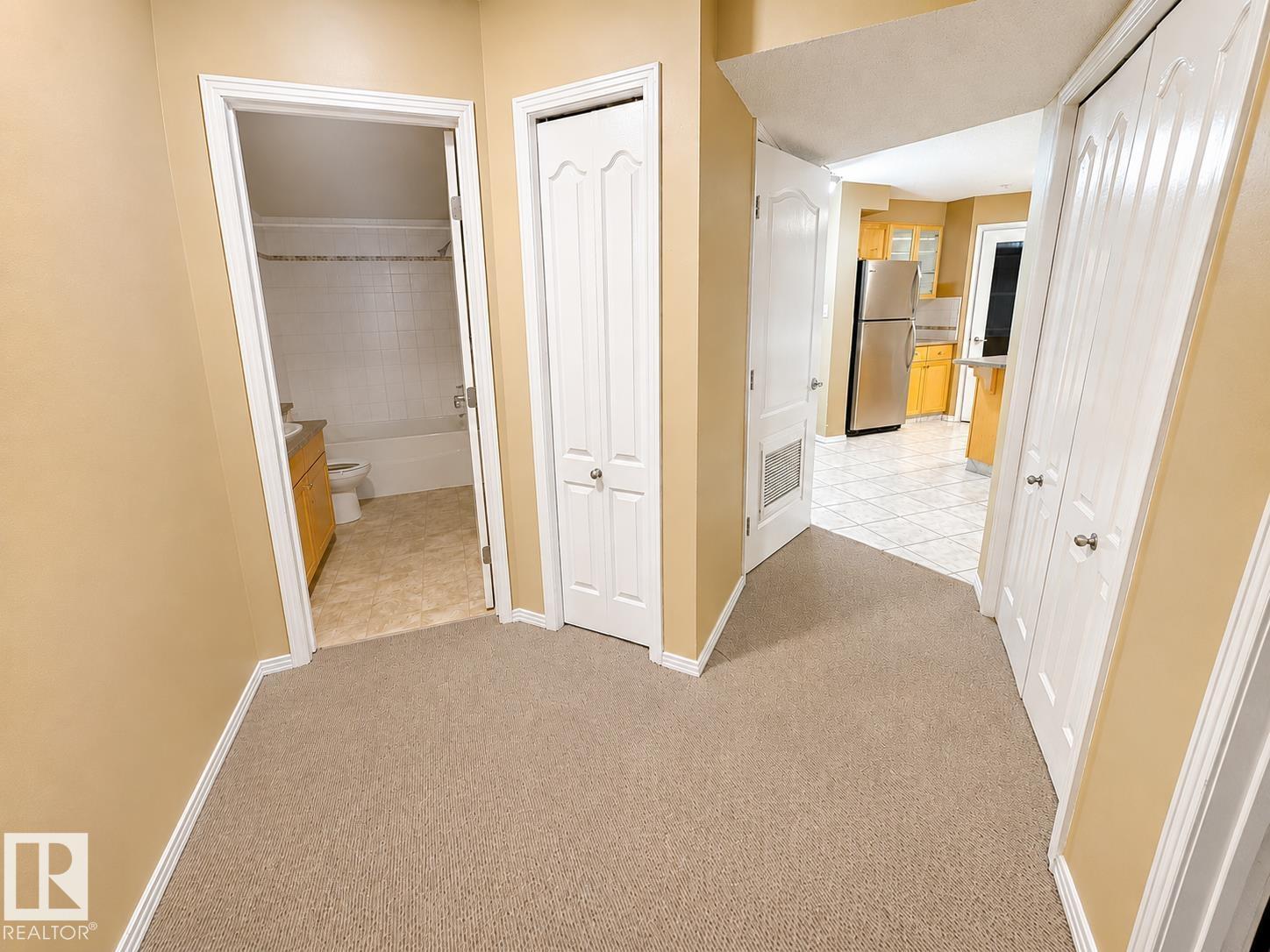 #203 8909 100 ST NW - 18